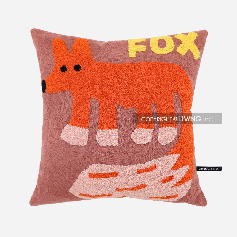 A square throw pillow with a pink background and an orange fox design with yellow lettering that says FOX.