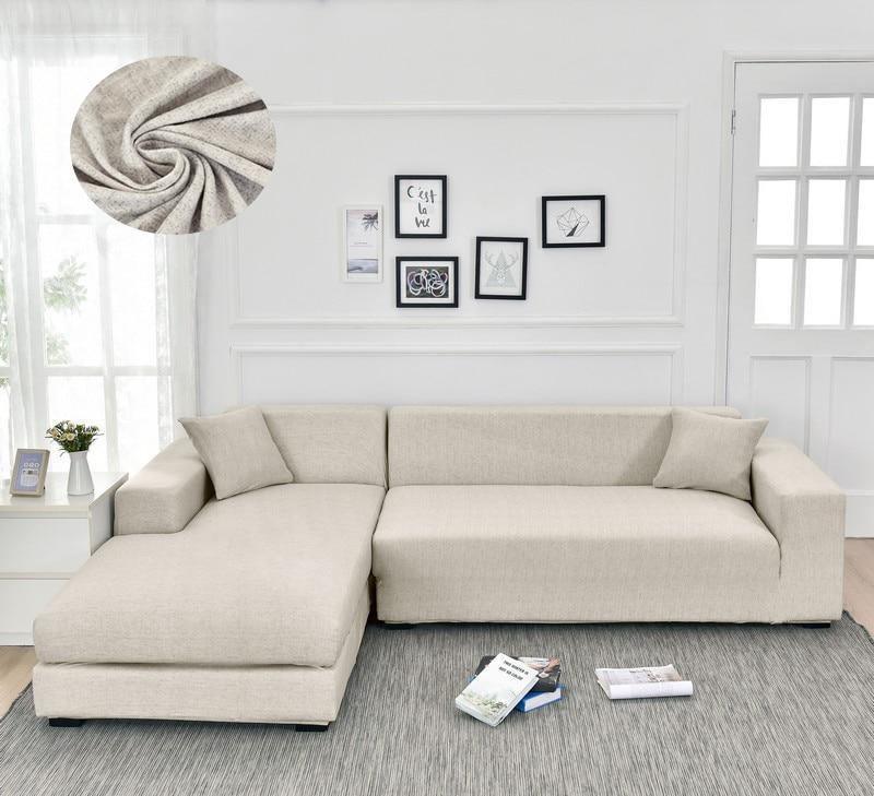 L-shaped sectional sofa cover in egg shell cross-weave pattern with chaise.