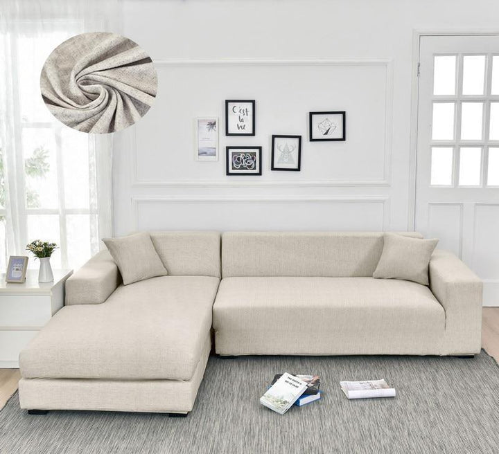 L-shaped sectional sofa cover in egg shell cross-weave pattern with chaise.