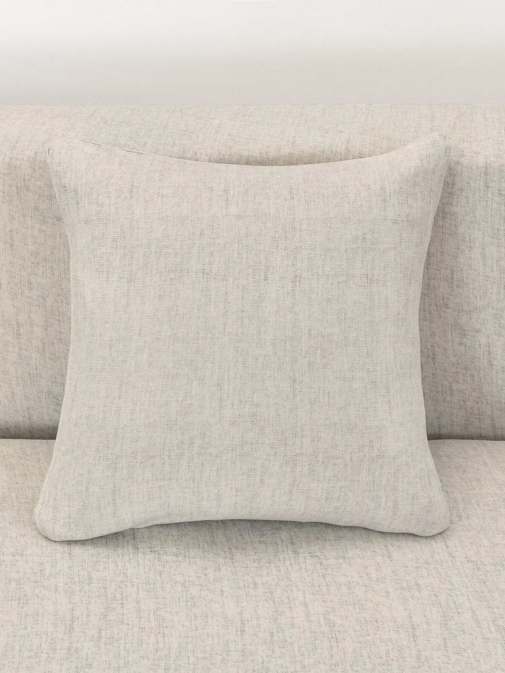 Egg shell colored L-shaped sofa cover with a subtle cross-weave pattern.