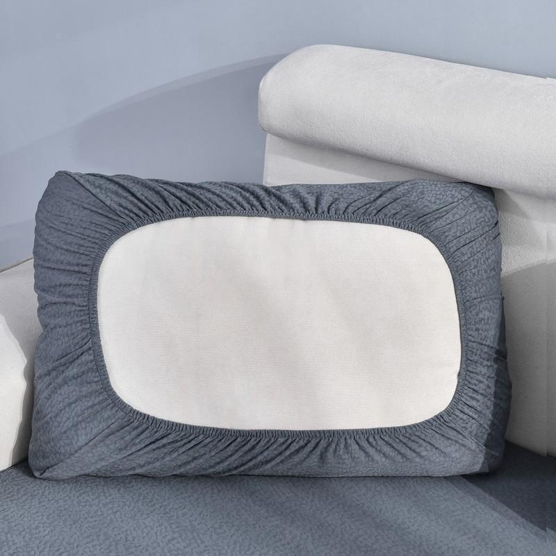 Dark grey waterproof sofa cushion cover with a textured pattern and elasticized edges.